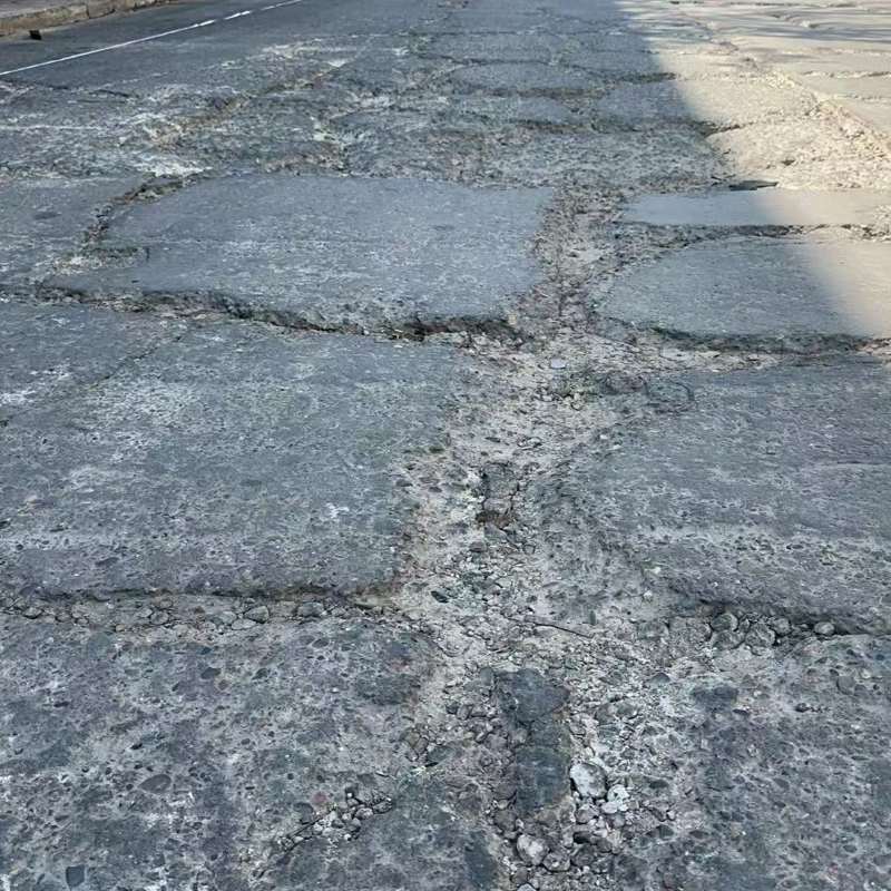 北宁路面起砂露石子修补料